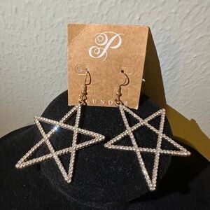 Silver star earrings with rhinestone accents.
